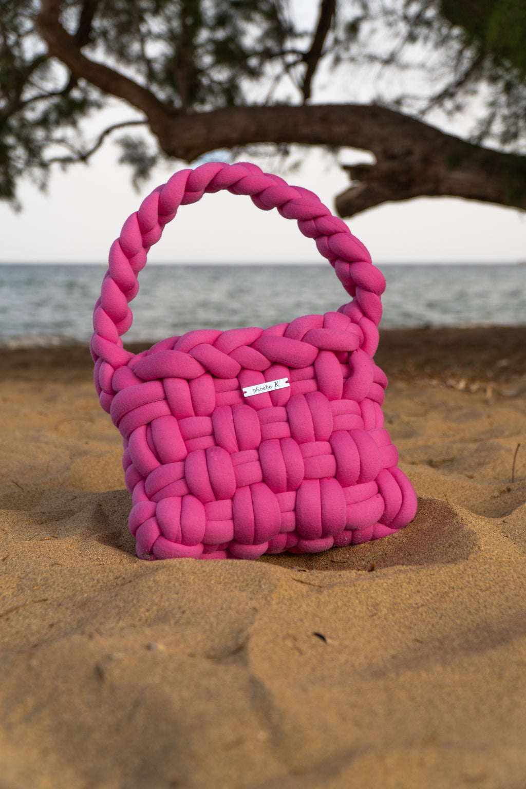 Enigma — Magenta Häkelsack
